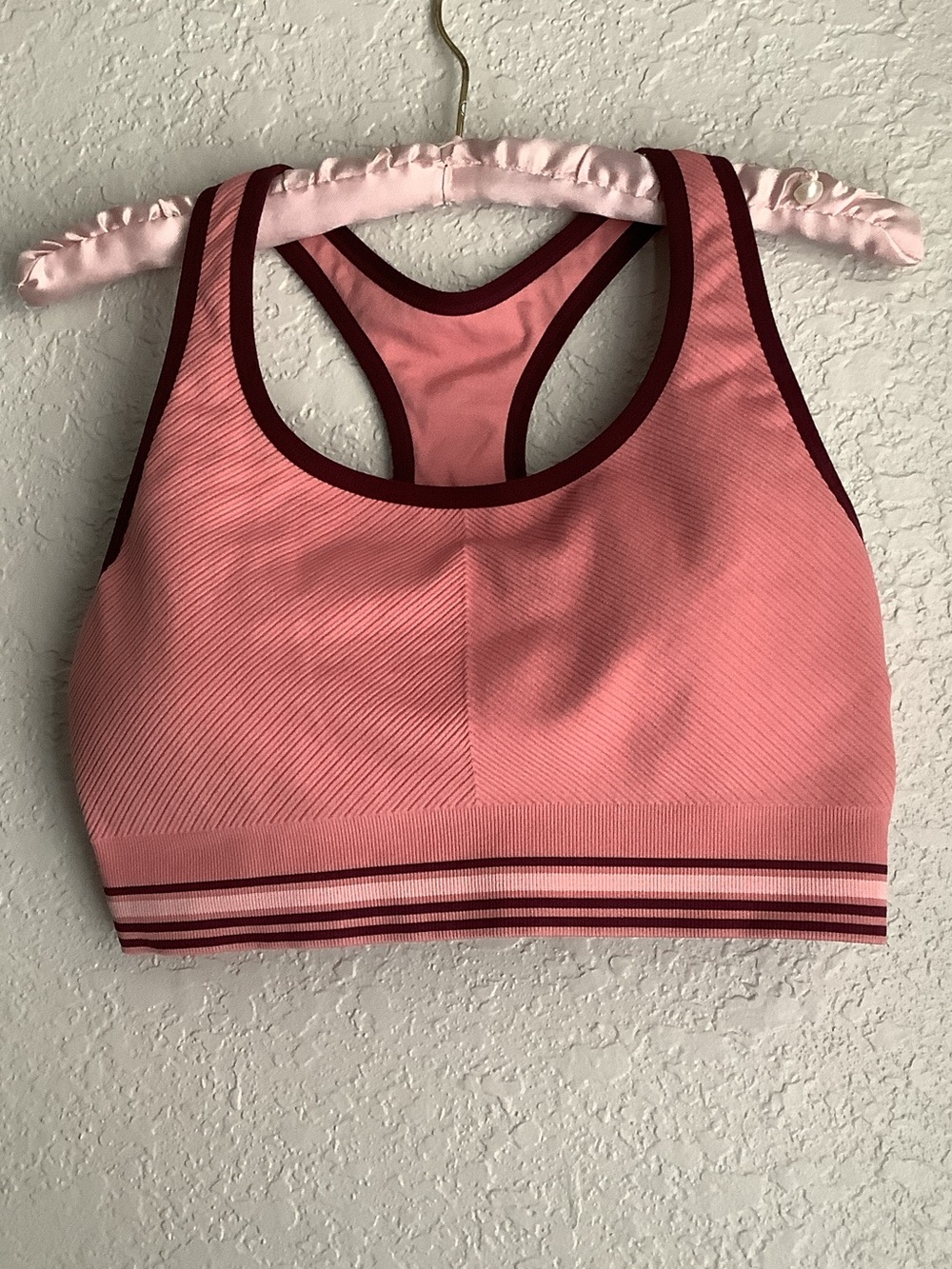 Seamless Pink Racerback Sports Bra with Maroon Trim